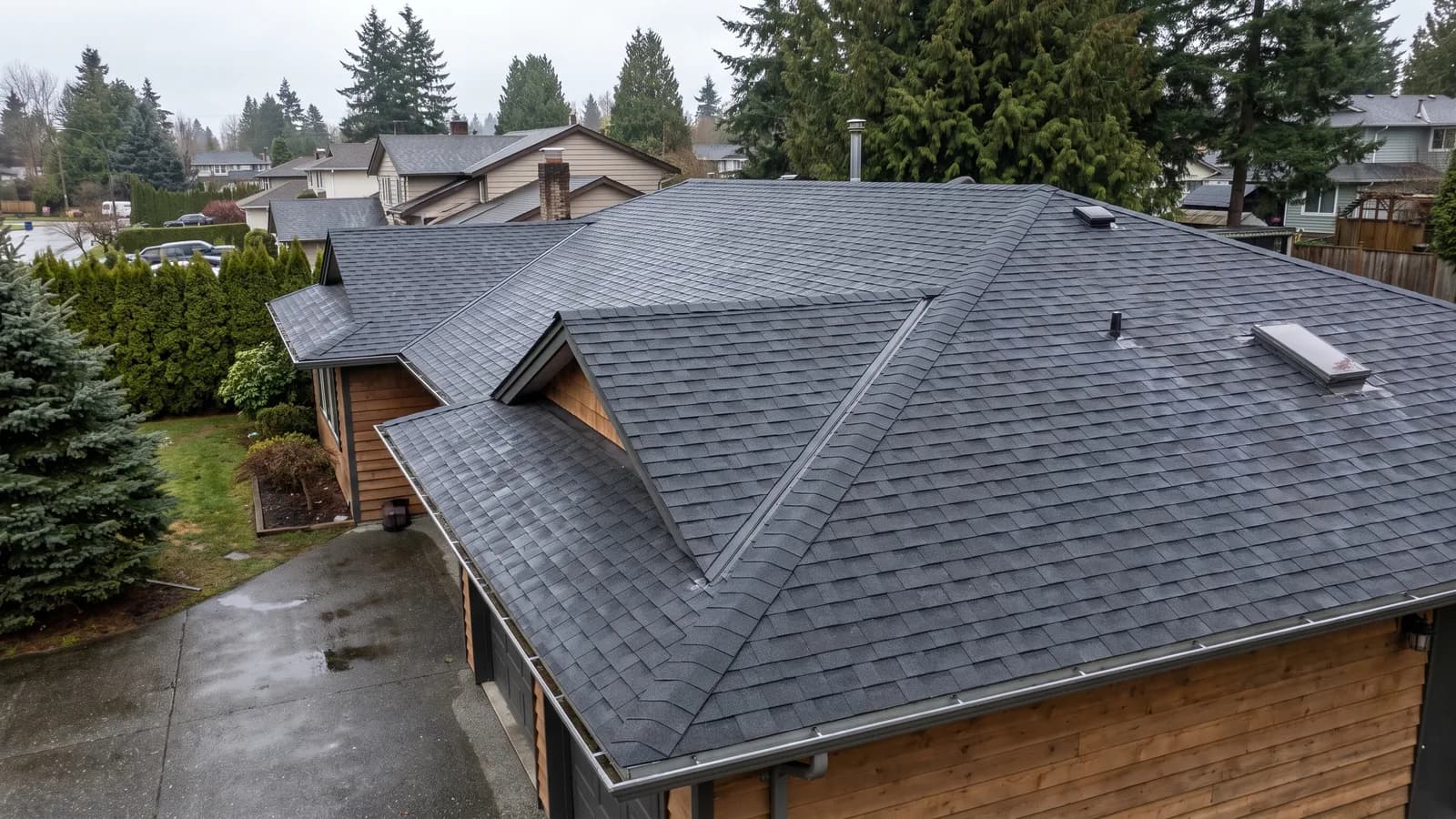 New architectural shingles on a Cloverdale home after rainfall